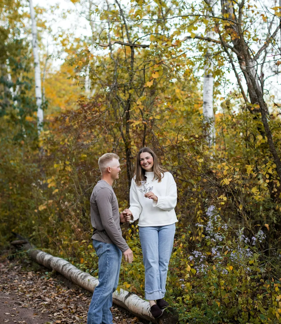 A couple enjoying clear vision together in warm autumn light